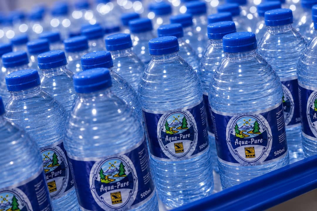 Aqua-Pure 500ml spring water bottles from the Bowler Beverage production line.